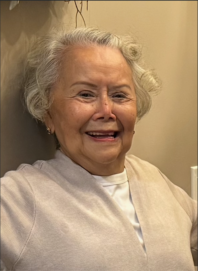 Mrs. Nghia Hoang smiling